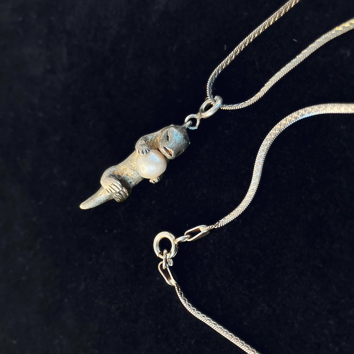 A Sea Otter Holding a Gem, Sterling Silver Pendant Necklace with a 4mm Freshwater Pearl