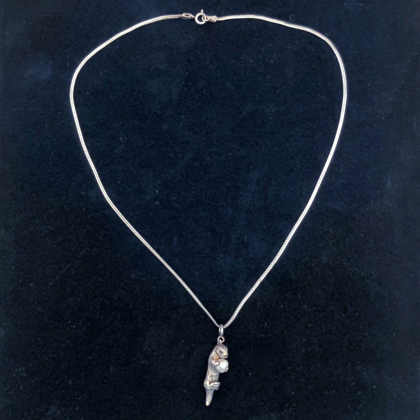 A Sea Otter Holding a Gem, Sterling Silver Pendant Necklace with a 4mm Freshwater Pearl