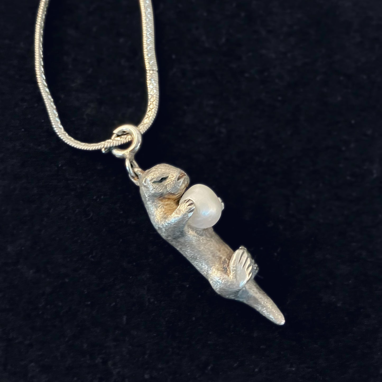 A Sea Otter Holding a Gem, Sterling Silver Pendant Necklace with a 4mm Freshwater Pearl